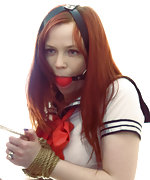 Redhead schoolgirl roped and ball-gagged